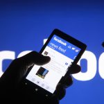 A smartphone user shows the Facebook application on his phone in Zenica, in this photo illustration