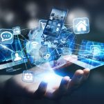 Tech devices and icons connected to digital planet earth